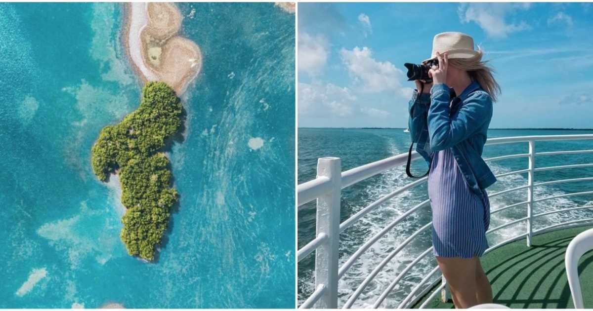 aerial photo of cabbage key and woman taking a photo